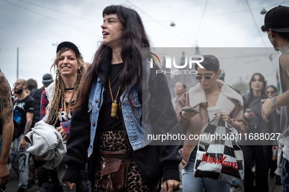 ADEV participants dance through the streets of Amsterdam, Netherlands, on October 19, 2024.  On Saturday, October 19, 2024, the ADEV (Amster...