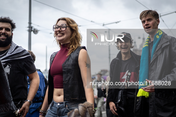 ADEV participants dance through the streets of Amsterdam, Netherlands, on October 19, 2024.  On Saturday, October 19, 2024, the ADEV (Amster...