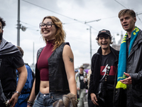 ADEV participants dance through the streets of Amsterdam, Netherlands, on October 19, 2024.  On Saturday, October 19, 2024, the ADEV (Amster...