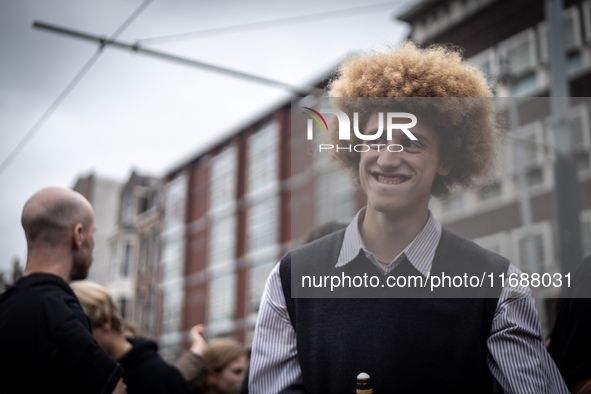 ADEV participants dance through the streets of Amsterdam, Netherlands, on October 19, 2024.  On Saturday, October 19, 2024, the ADEV (Amster...