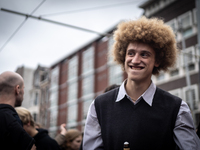 ADEV participants dance through the streets of Amsterdam, Netherlands, on October 19, 2024.  On Saturday, October 19, 2024, the ADEV (Amster...