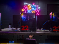 An Iranian man plays a video game at a gaming venue at night in the historical city of Tabriz, Iran, on October 18, 2024, amid global concer...