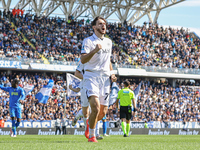 Khvicha Kvaratskhelia celebrates with teammates after scoring a goal during the Serie A match between Empoli FC and SSC Napoli in Empoli, It...