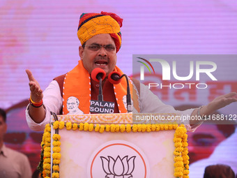 Rajasthan Chief Minister Bhajanlal Sharma speaks during a ceremony upon his return to India after concluding his visit to the UK to attract...