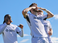 Khvicha Kvaratskhelia celebrates with teammates after scoring a goal during the Serie A match between Empoli FC and SSC Napoli in Empoli, It...