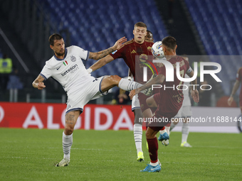 Inter's Francesco Acerbi and Roma's Artem Dovbyk participate in the Serie A soccer match AS Roma - Inter FC at Stadio Olimpico in Rome, Ital...