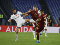 Inter's Francesco Acerbi and Roma's Artem Dovbyk participate in the Serie A soccer match AS Roma - Inter FC at Stadio Olimpico in Rome, Ital...