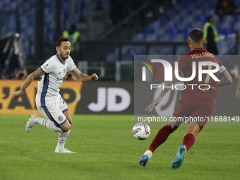 Inter's Hakan Calhanoglu plays during the Serie A soccer match between AS Roma and Inter FC at Stadio Olimpico in Rome, Italy, on October 20...