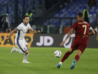 Inter's Hakan Calhanoglu plays during the Serie A soccer match between AS Roma and Inter FC at Stadio Olimpico in Rome, Italy, on October 20...