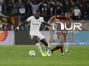 Inter's Marcus Thuram and Roma's Bryan Cristante participate in the Serie A soccer match between AS Roma and Inter FC at Stadio Olimpico in...