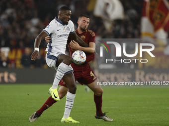 Inter's Marcus Thuram and Roma's Bryan Cristante participate in the Serie A soccer match between AS Roma and Inter FC at Stadio Olimpico in...