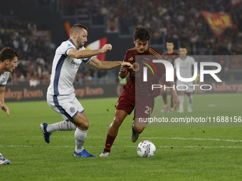 Inter's Stefan De Vrij and Roma's Paulo Dybala participate in the Serie A soccer match between AS Roma and Inter FC at Stadio Olimpico in Ro...