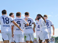 Khvicha Kvaratskhelia celebrates with teammates after scoring a goal during the Serie A match between Empoli FC and SSC Napoli in Empoli, It...