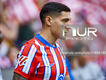 Nahuel Molina of Atletico de Madrid enters the field during the La Liga EA Sports 2024/25 football match between Atletico de Madrid and CD L...