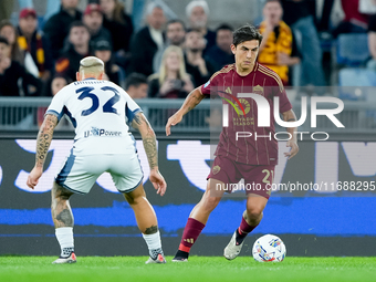 Paulo Dybala of AS Roma and Federico Dimarco of FC Internazionale during the Serie A Enilive match between AS Roma and FC Internazionale at...