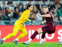 Yann Sommer of FC Internazionale and Artem Dovbyk of AS Roma during the Serie A Enilive match between AS Roma and FC Internazionale at Stadi...