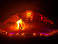 A Zoolians artist captivates the audience with a fiery performance during the closing show of '????????'?????: Arcanes' in the Arles arenas....