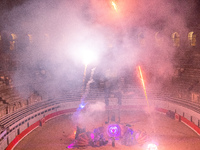 A Zoolians artist captivates the audience with a fiery performance during the closing show of '????????'?????: Arcanes' in the Arles arenas....