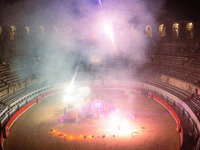 A Zoolians artist captivates the audience with a fiery performance during the closing show of '????????'?????: Arcanes' in the Arles arenas....