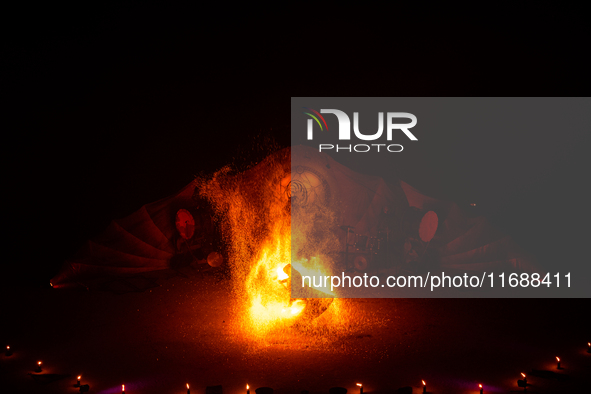 A Zoolians artist captivates the audience with a fiery performance during the closing show of '????????'?????: Arcanes' in the Arles arenas....