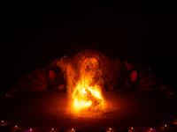 A Zoolians artist captivates the audience with a fiery performance during the closing show of '????????'?????: Arcanes' in the Arles arenas....