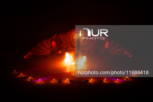 A Zoolians artist captivates the audience with a fiery performance during the closing show of '????????'?????: Arcanes' in the Arles arenas....