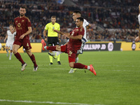 Inter's Lautaro Martinez scores their first goal during the Serie A soccer match between AS Roma and Inter FC at Stadio Olimpico in Rome, It...