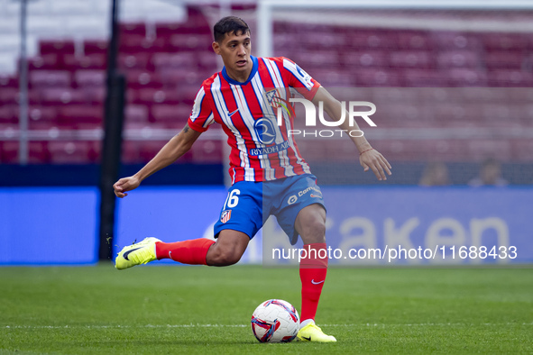 Nahuel Molina of Atletico de Madrid is in action with the ball during the La Liga EA Sports 2024/25 football match between Atletico de Madri...