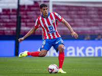 Nahuel Molina of Atletico de Madrid is in action with the ball during the La Liga EA Sports 2024/25 football match between Atletico de Madri...