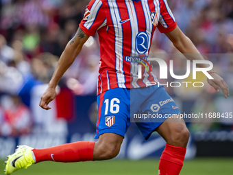 Nahuel Molina of Atletico de Madrid is in action with the ball during the La Liga EA Sports 2024/25 football match between Atletico de Madri...