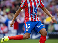 Nahuel Molina of Atletico de Madrid is in action with the ball during the La Liga EA Sports 2024/25 football match between Atletico de Madri...