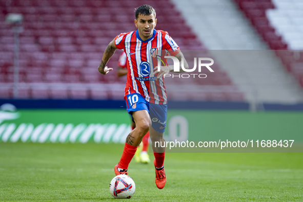 Angel Correa of Atletico de Madrid is in action with the ball during the La Liga EA Sports 2024/25 football match between Atletico de Madrid...