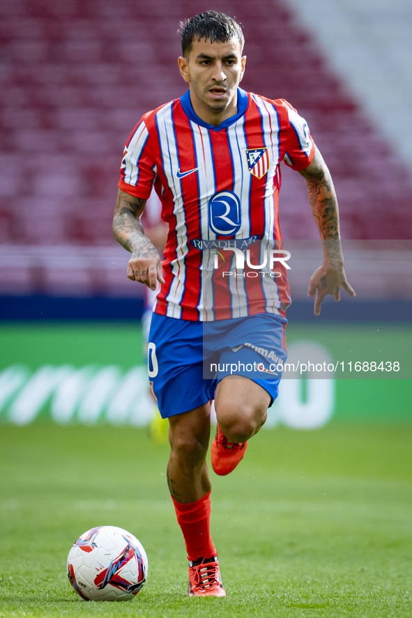 Angel Correa of Atletico de Madrid is in action with the ball during the La Liga EA Sports 2024/25 football match between Atletico de Madrid...