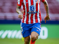 Angel Correa of Atletico de Madrid is in action with the ball during the La Liga EA Sports 2024/25 football match between Atletico de Madrid...