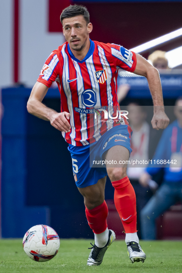 Clement Lenglet of Atletico de Madrid is in action with the ball during the La Liga EA Sports 2024/25 football match between Atletico de Mad...