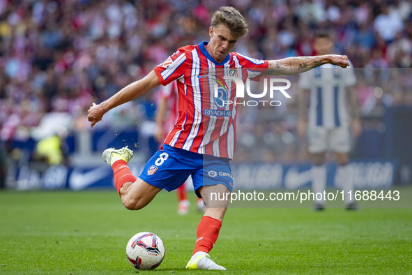 Pablo Barrios of Atletico de Madrid attempts a kick during the La Liga EA Sports 2024/25 football match between Atletico de Madrid and CD Le...