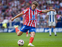 Pablo Barrios of Atletico de Madrid attempts a kick during the La Liga EA Sports 2024/25 football match between Atletico de Madrid and CD Le...