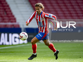 Antoine Griezmann of Atletico de Madrid is in action with the ball during the La Liga EA Sports 2024/25 football match between Atletico de M...