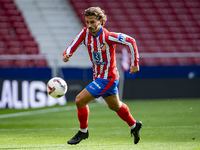 Antoine Griezmann of Atletico de Madrid is in action with the ball during the La Liga EA Sports 2024/25 football match between Atletico de M...