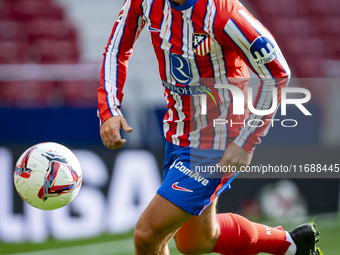 Antoine Griezmann of Atletico de Madrid is in action with the ball during the La Liga EA Sports 2024/25 football match between Atletico de M...