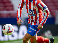 Antoine Griezmann of Atletico de Madrid is in action with the ball during the La Liga EA Sports 2024/25 football match between Atletico de M...