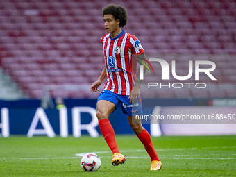 Axel Witsel of Atletico de Madrid is in action with the ball during the La Liga EA Sports 2024/25 football match between Atletico de Madrid...