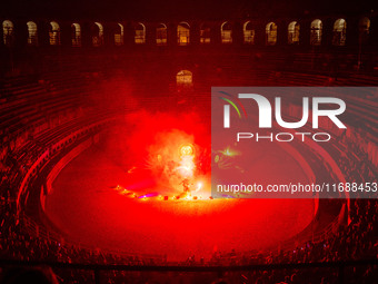 A Zoolians artist captivates the audience with a fiery performance during the closing show of '????????'?????: Arcanes' in the Arles arenas....