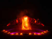 A Zoolians artist captivates the audience with a fiery performance during the closing show of '????????'?????: Arcanes' in the Arles arenas....