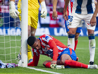 Samuel Lino of Atletico de Madrid is on the ground during the La Liga EA Sports 2024/25 football match between Atletico de Madrid and CD Leg...