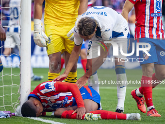 Samuel Lino of Atletico de Madrid is on the ground during the La Liga EA Sports 2024/25 football match between Atletico de Madrid and CD Leg...