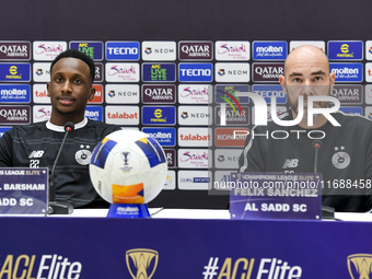 Felix Sanchez Bas, Head Coach of Al Sadd FC, and player Meshal Barsham attend a press conference at Jassim Bin Hamad Stadium in Doha, Qatar,...