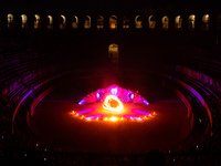 A Zoolians artist captivates the audience with a fiery performance during the closing show of '????????'?????: Arcanes' in the Arles arenas....