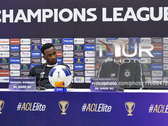 Felix Sanchez Bas, Head Coach of Al Sadd FC, and player Meshal Barsham attend a press conference at Jassim Bin Hamad Stadium in Doha, Qatar,...