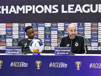 Felix Sanchez Bas, Head Coach of Al Sadd FC, and player Meshal Barsham attend a press conference at Jassim Bin Hamad Stadium in Doha, Qatar,...